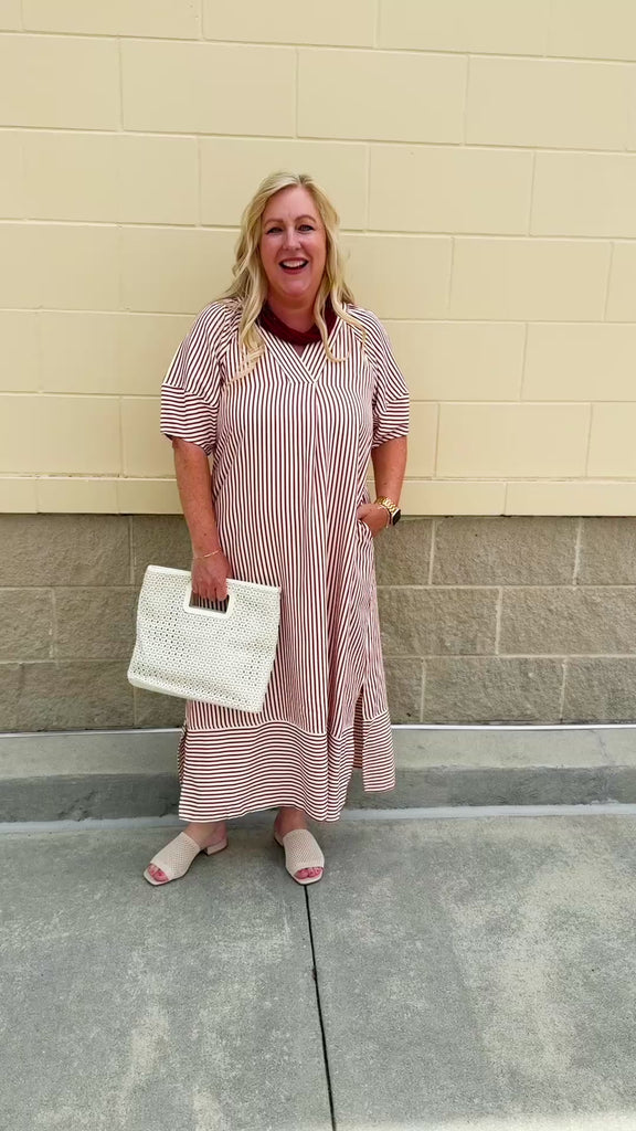 Garnet and cream striped midi dress with lantern sleeves, V-neckline, side slits, and horizontal stripe contrast at hem and sleeve cuffs