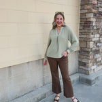 Sage Signature Blouse in sage green with long sleeves, a V-neckline