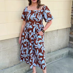 Bluebell Grove brown dress with light blue leaf pattern and short sleeves