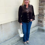  Brown velvet blouse with a ruffle neckline, silver sparkle buttons, and long sleeves