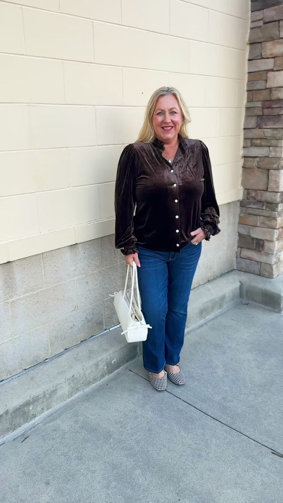  Brown velvet blouse with a ruffle neckline, silver sparkle buttons, and long sleeves