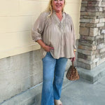 Café Season light brown long sleeve button-down blouse with ruffle collar and cuffs