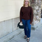 Brown knit sweater in a rich cocoa hue