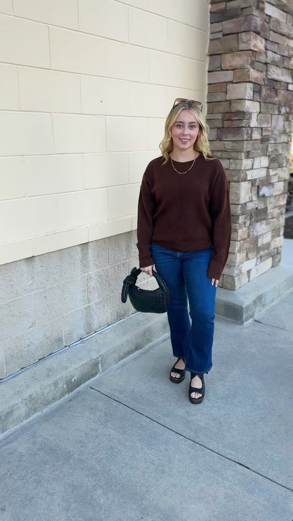 Brown knit sweater in a rich cocoa hue