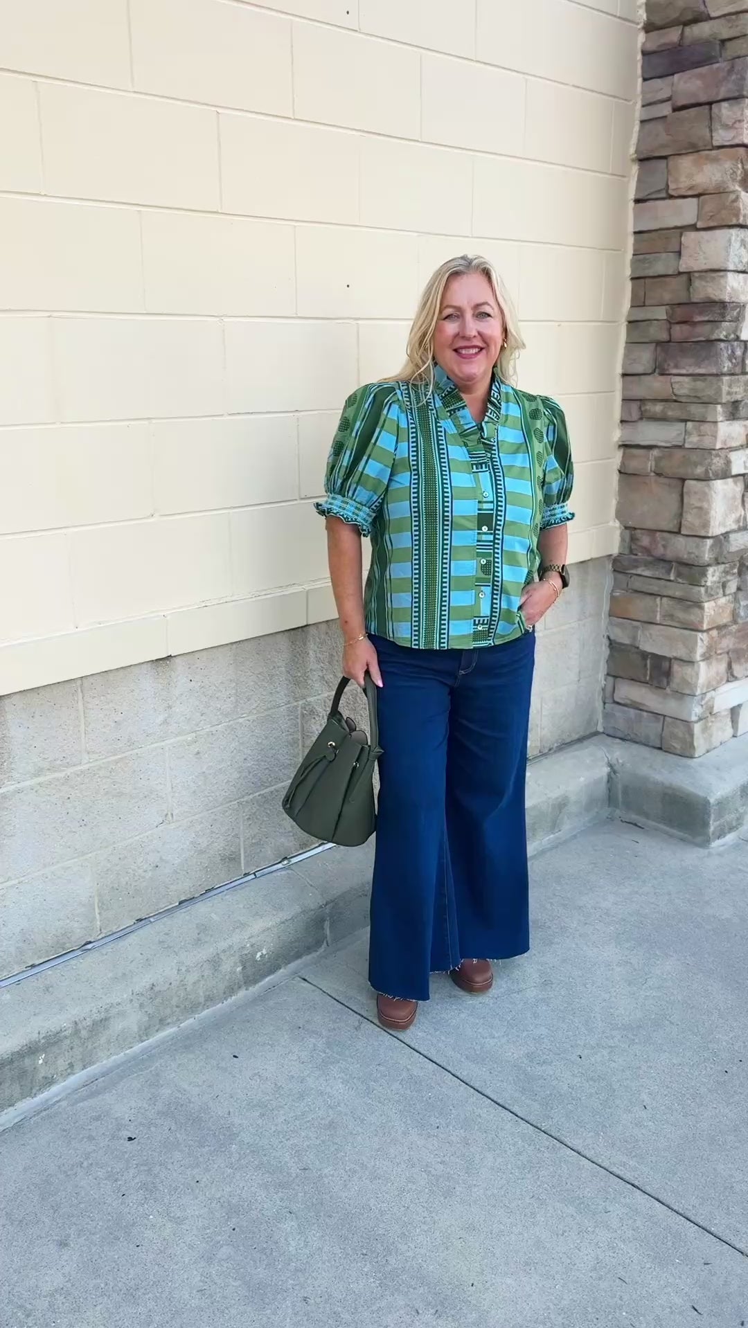 [Entro] Willow Embroidered Blouse featuring a green and light blue geometric pattern, V-neckline, puff sleeves, dark green trim, and embroidered details.