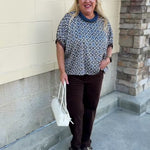 Mosaic Daydream blouse with a blue, brown, and white geometric print