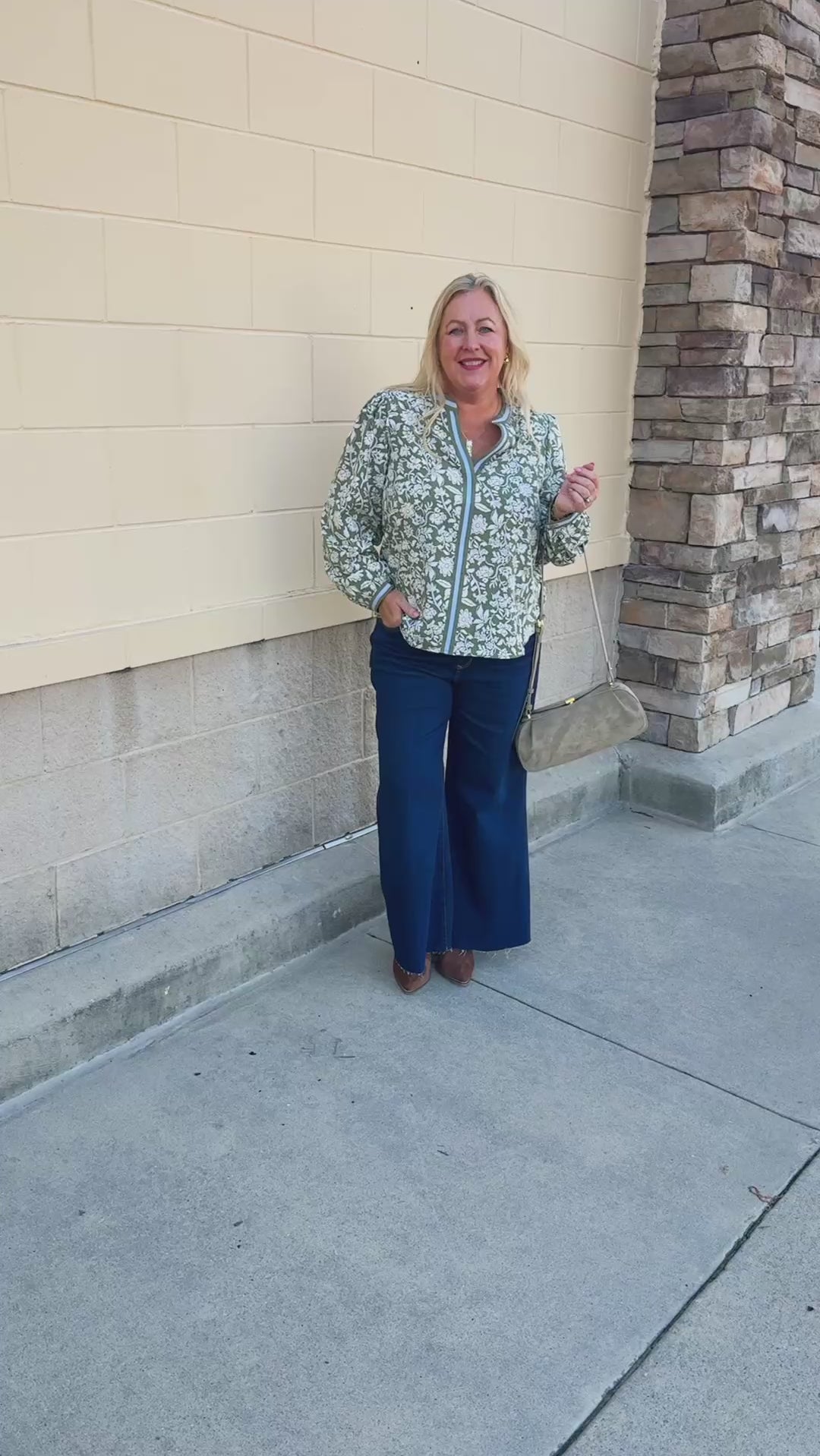  Mary Square Naomi Top in Painted Trillium Olive featuring a high split neckline and long sleeves with button cuffs