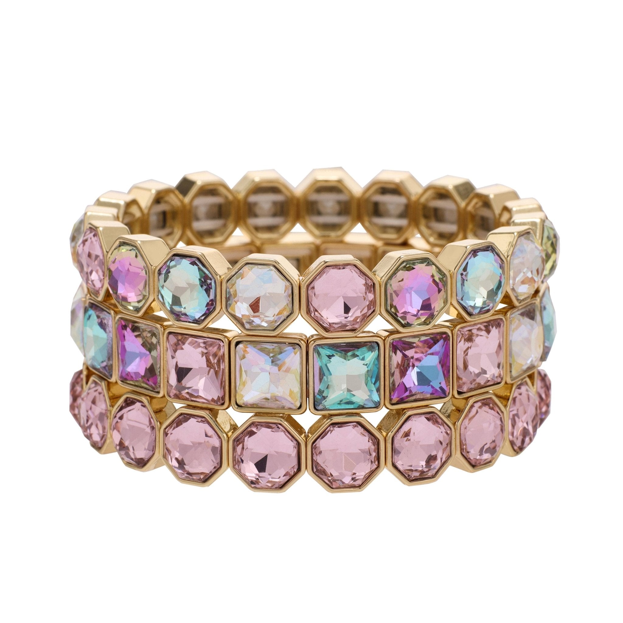 Three gold-tone bracelets with blush pink and iridescent crystals