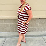 Garnet and cream striped zip-up mini dress with collar, drop sleeves, drawstring waist, and pockets—sporty and perfect for FSU gameday