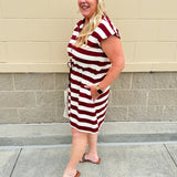 Garnet and cream striped zip-up mini dress with collar, drop sleeves, drawstring waist, and pockets—sporty and perfect for FSU gameday