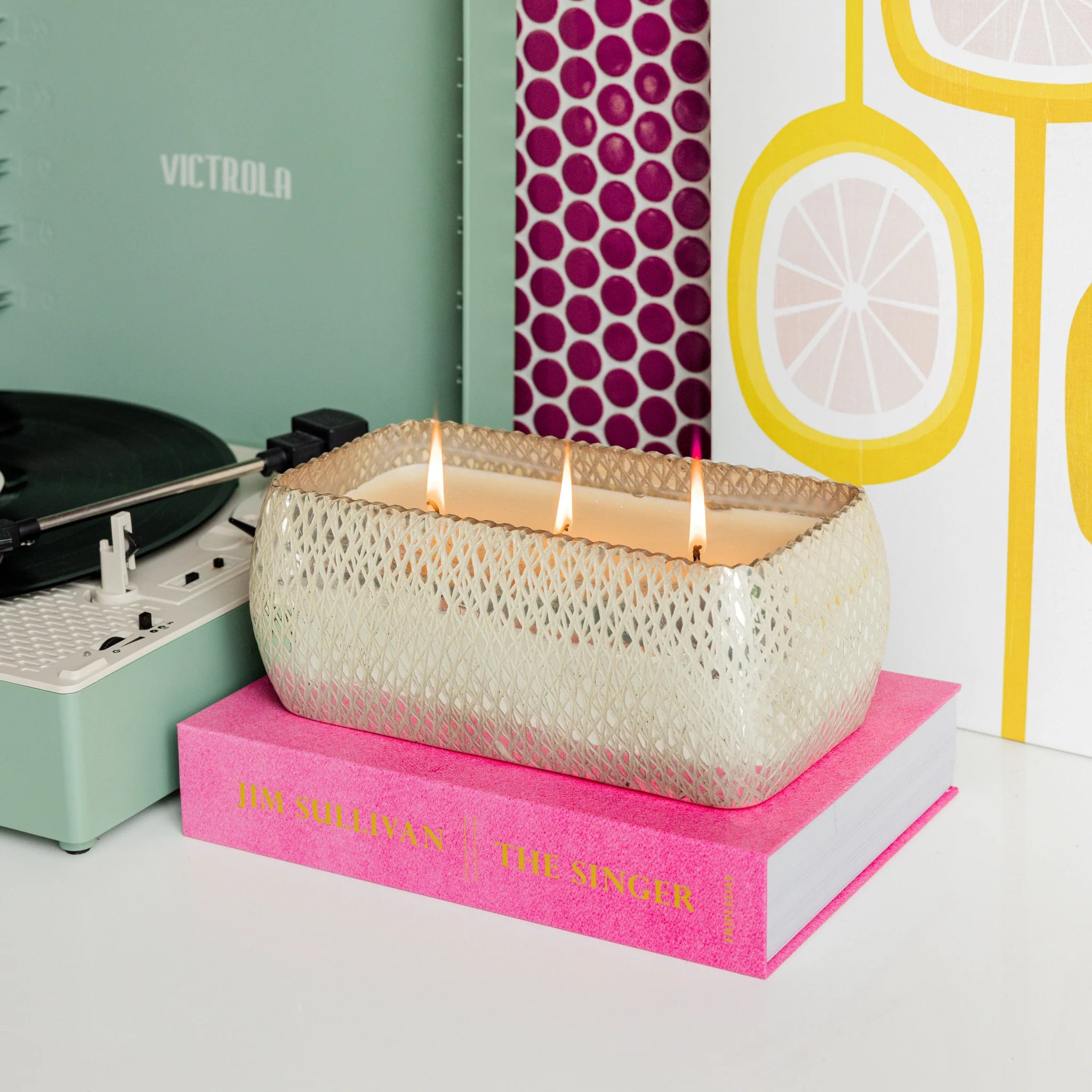 Silver mosaic three-wick candle with a rectangular silhouette, displayed as elegant home décor