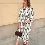 Whispered Petals Smocked Midi Dress - The Pink Pineapple 850