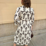 Whispered Petals Smocked Midi Dress - The Pink Pineapple 850