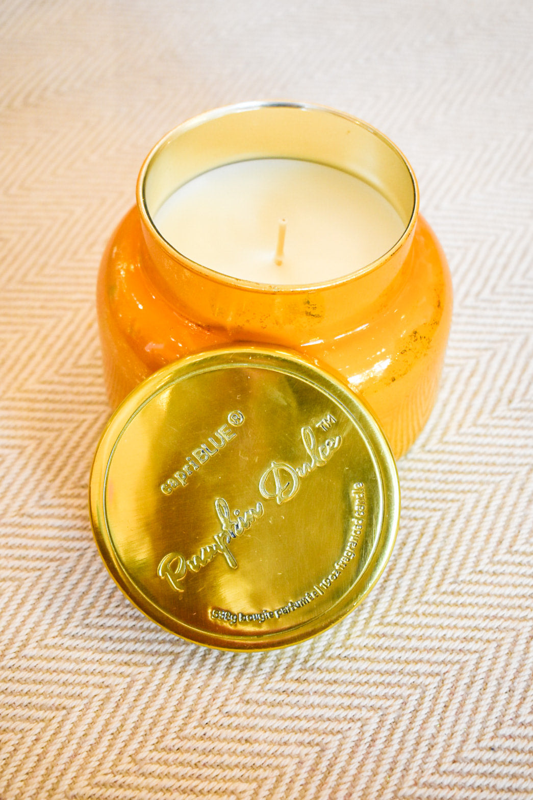 Large ombré glass candle in warm fall tones