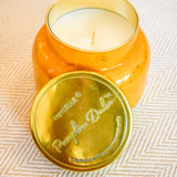 Large ombré glass candle in warm fall tones