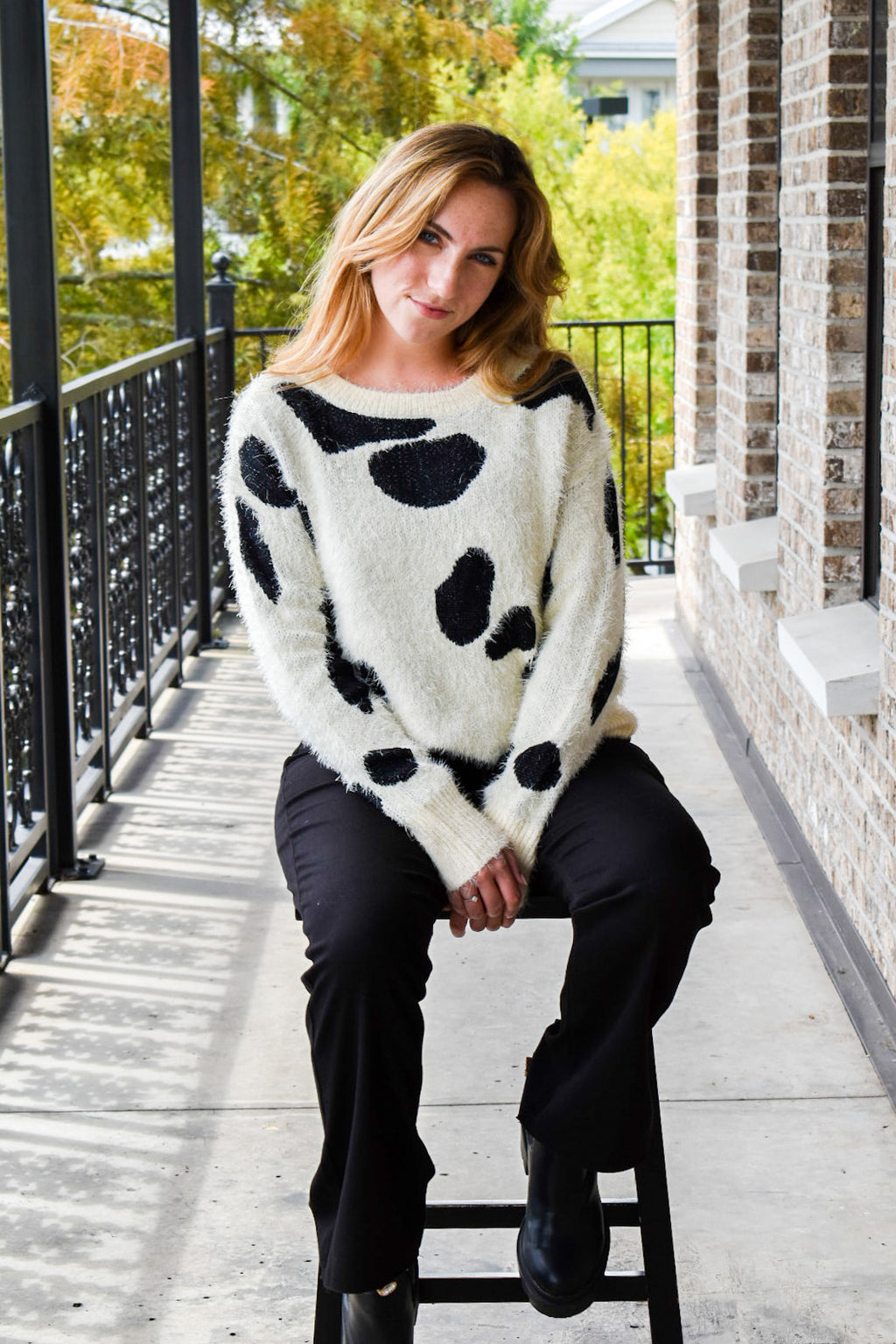 Somebody's Problem Cow Print Sweater